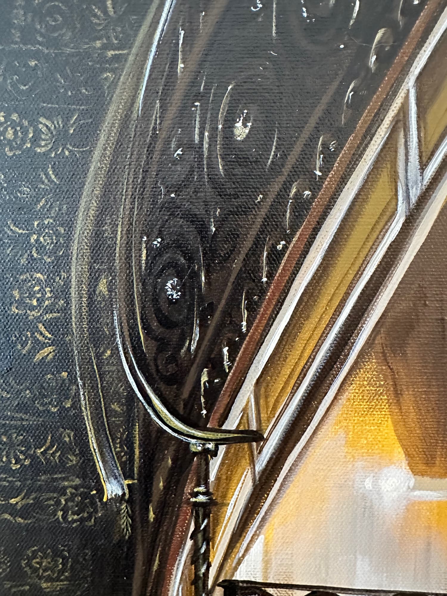 Closeup of the wrought-iron banister and warm wall texture in the grand staircase painting